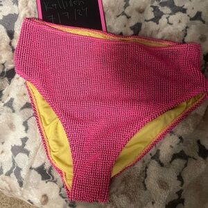 Pink textured swim suit bottoms